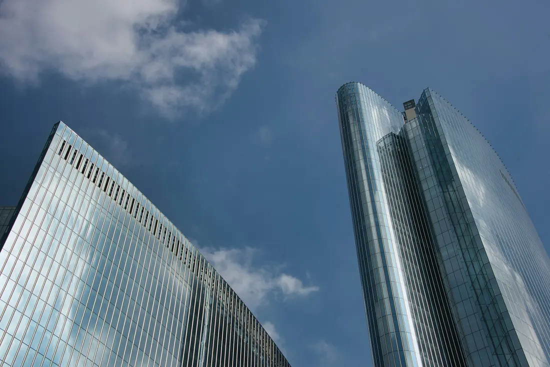Glass office towers rising above the Makati business district